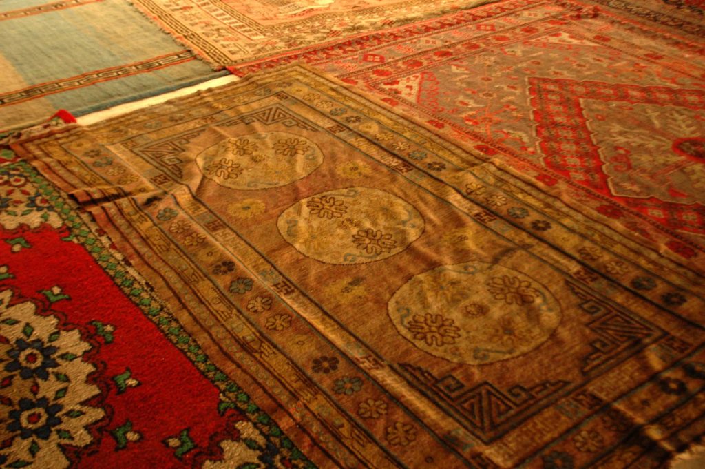 Central Asian carpets and prayer rugs at Jama Masjid, Main Bazar, Leh. Abeer Gupta 2010