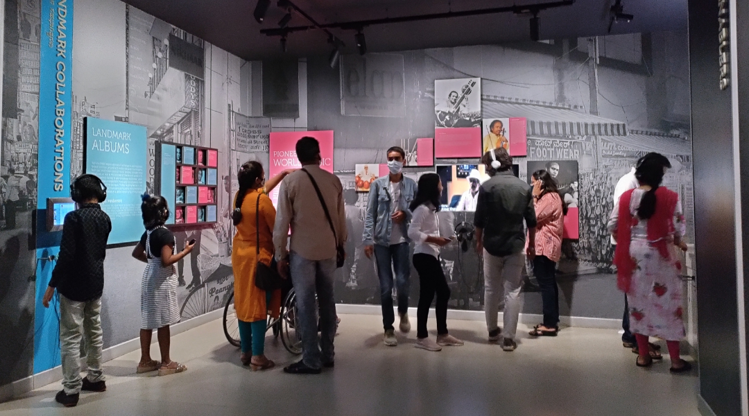 Visitors at a museum gallery in Indian Music Experience Museum